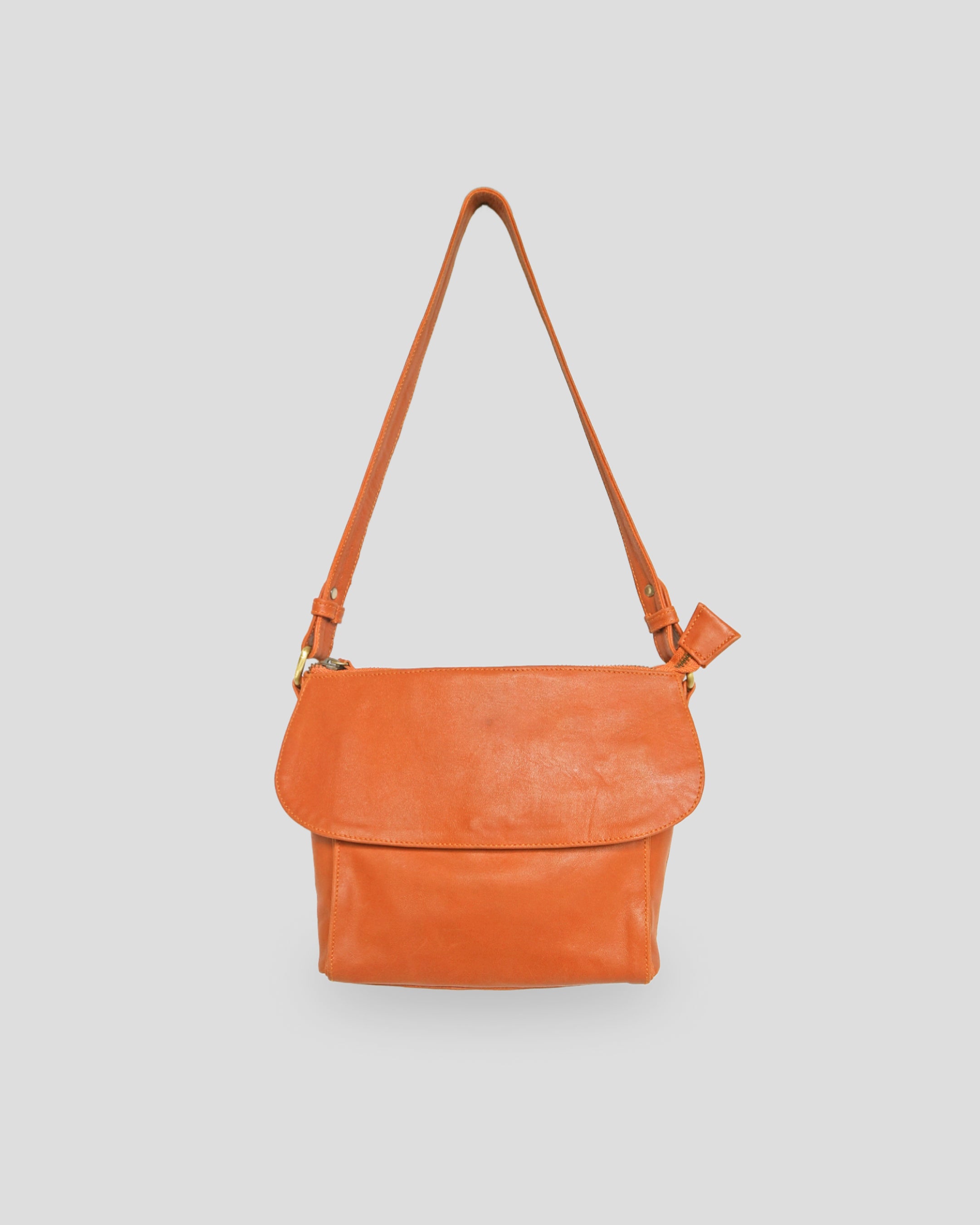 Simple Fabrys sling bag by Nma Leather Bali