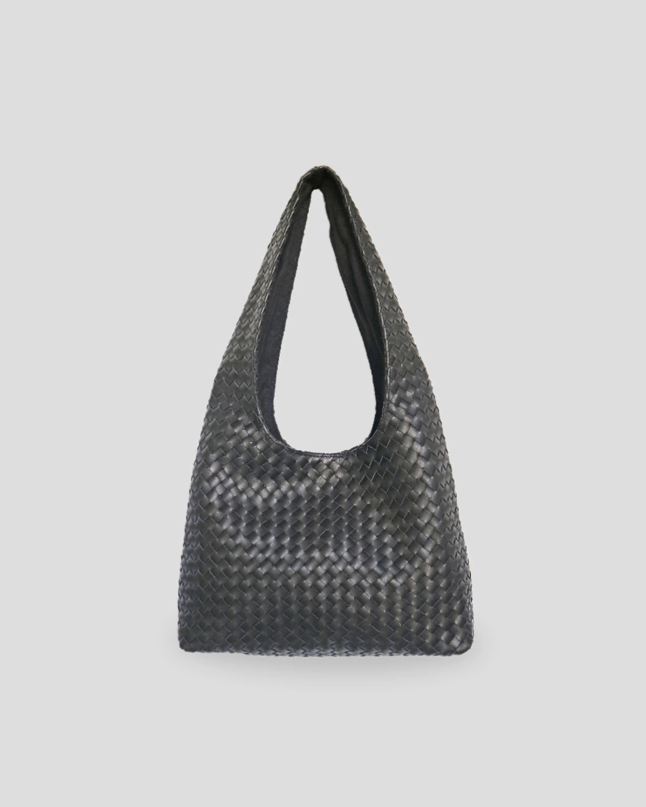 Full view of black woven shoulder bag for women displaying elegant silhouette and comfortable strap design