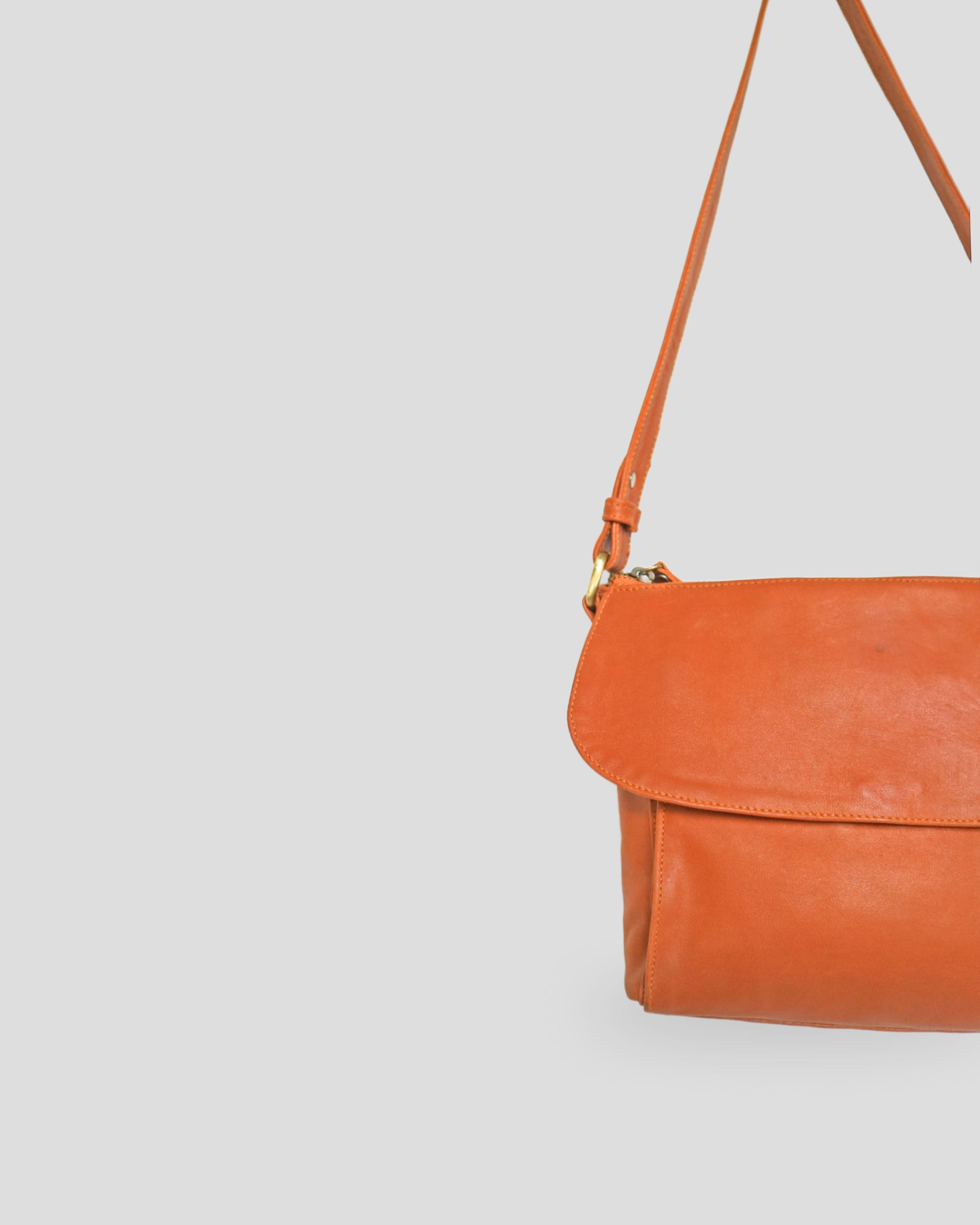 Simple Fabrys sling bag by Nma Leather Bali