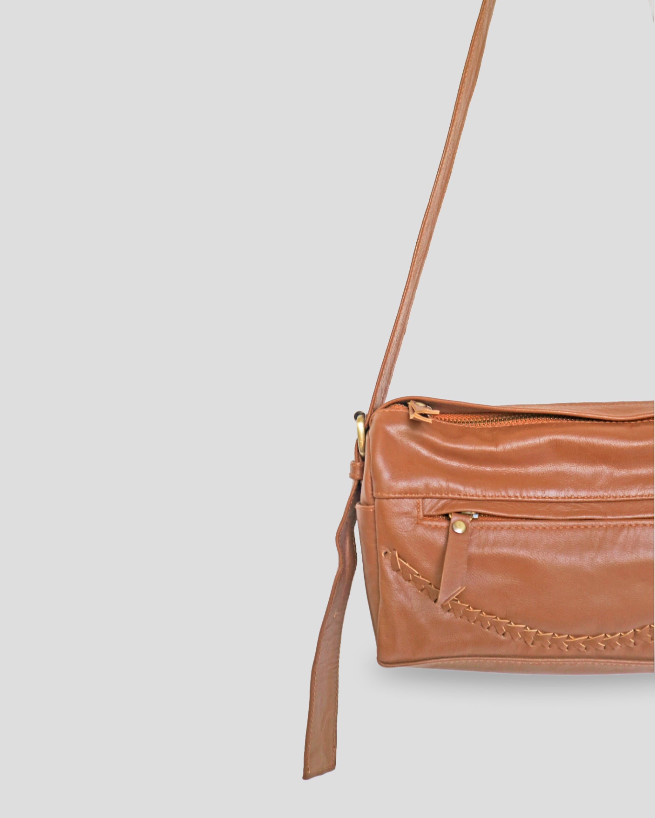 One Pocket Anyam sling bag by Nam Leather Bali