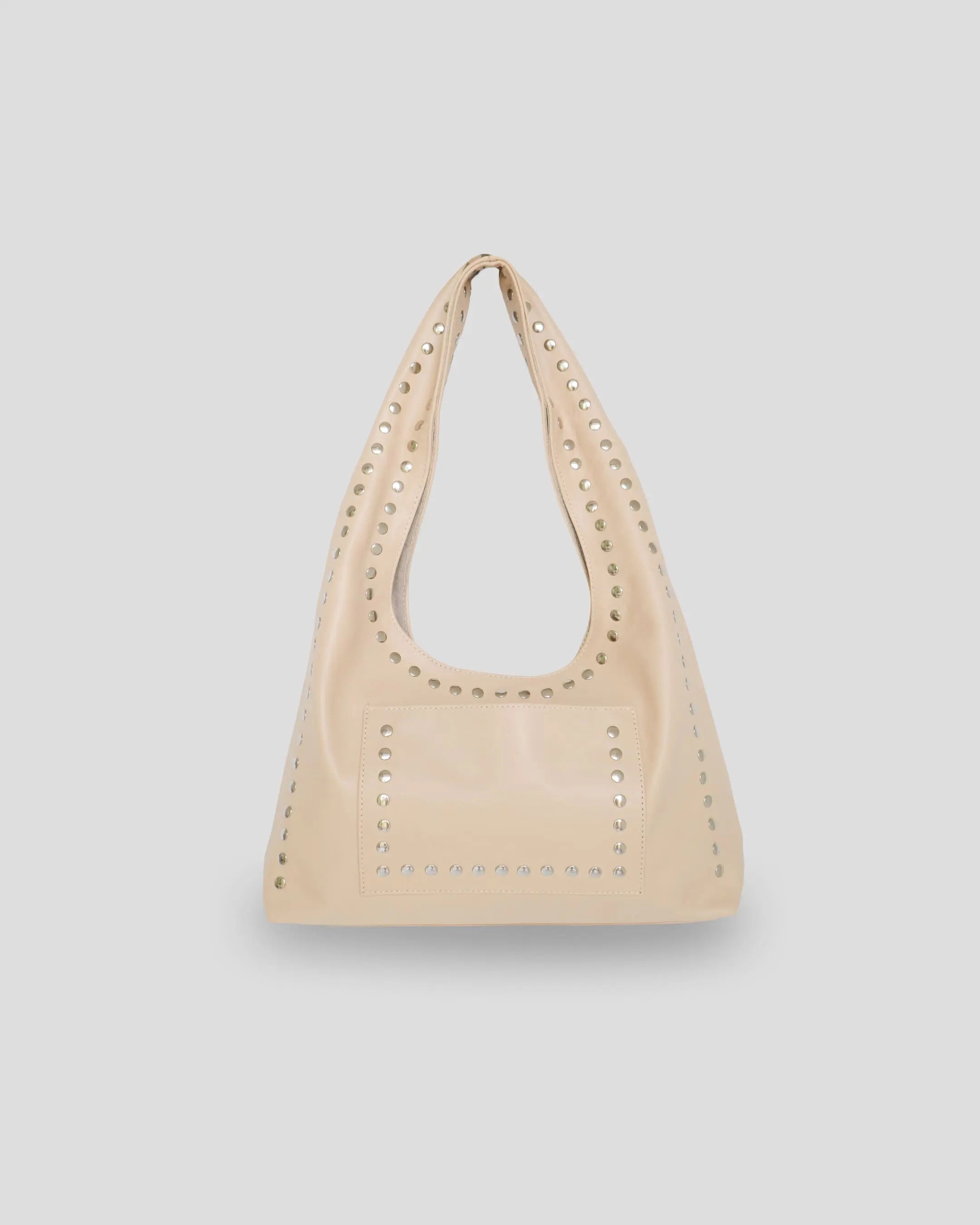 Beige handbag with studded details on a light gray background